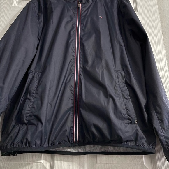 Tommy Hilfiger Navy Jacket with Red and White Accents/ in a good used condition. - Picture 2 of 3